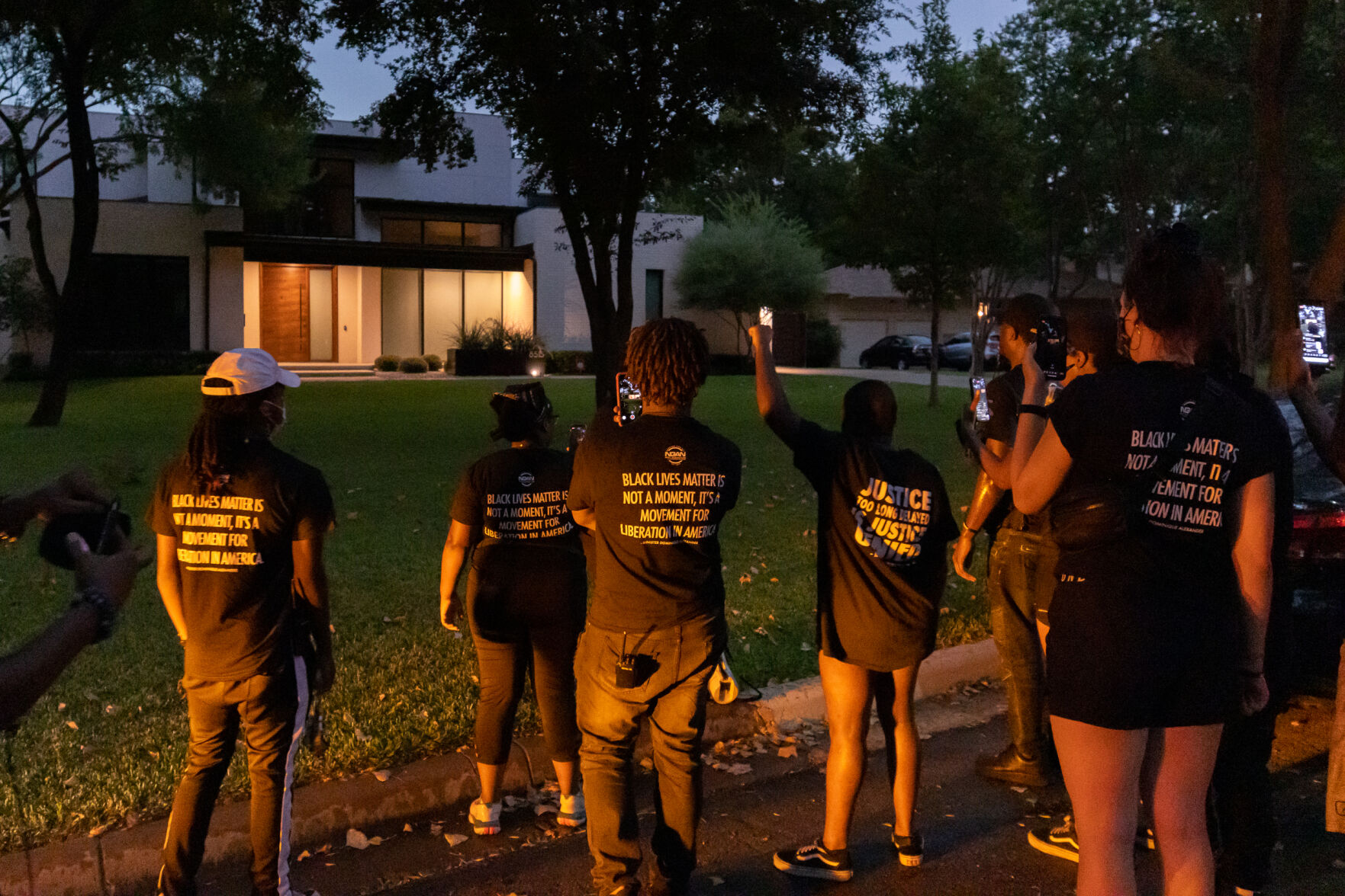 Photos: Protesters march down U.S. 75, chant outside home of Dallas mayor to call for racial justiceP